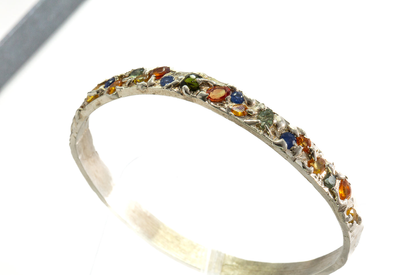 Sapphires in Silver: 21 stone multi colour Bangle