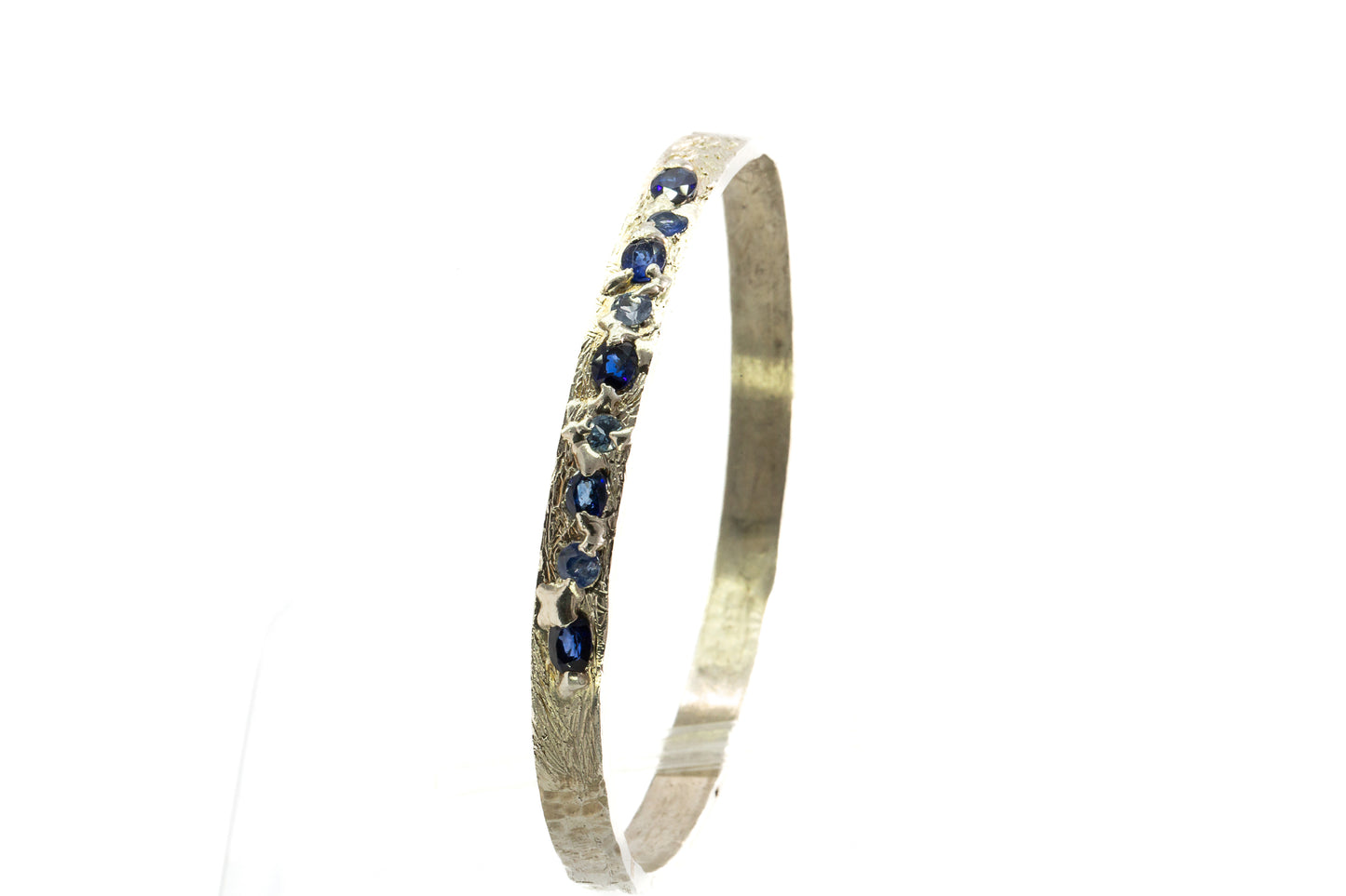 Sapphires in Silver: 9 stone blue  Bangle