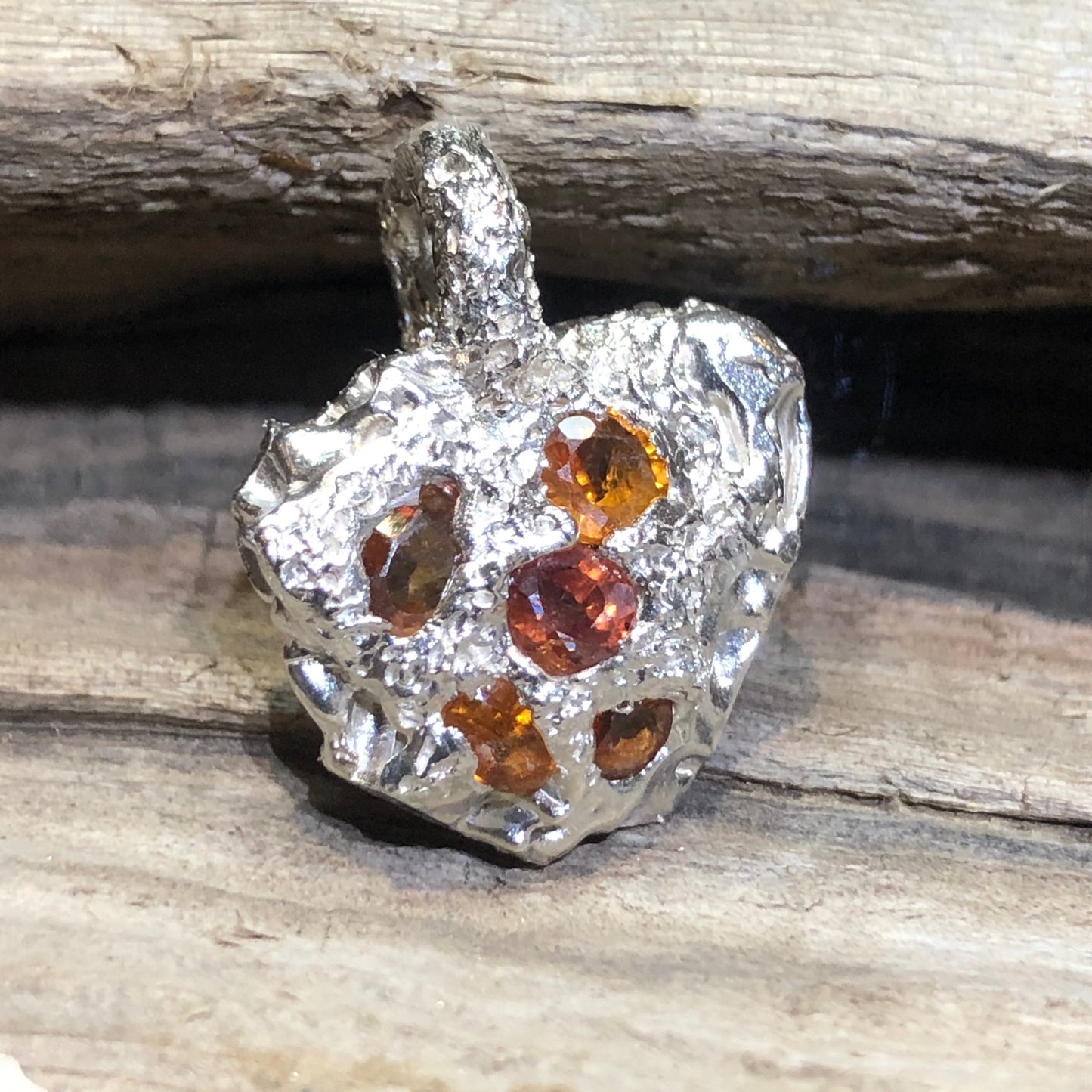 Sapphires in Silver: 5 orange cut sapphires in freeform Pendant